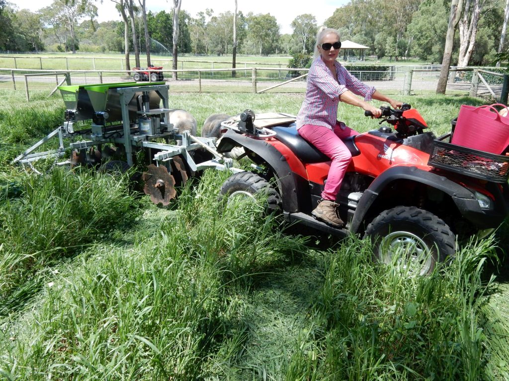 Mowing the home-grown pasture